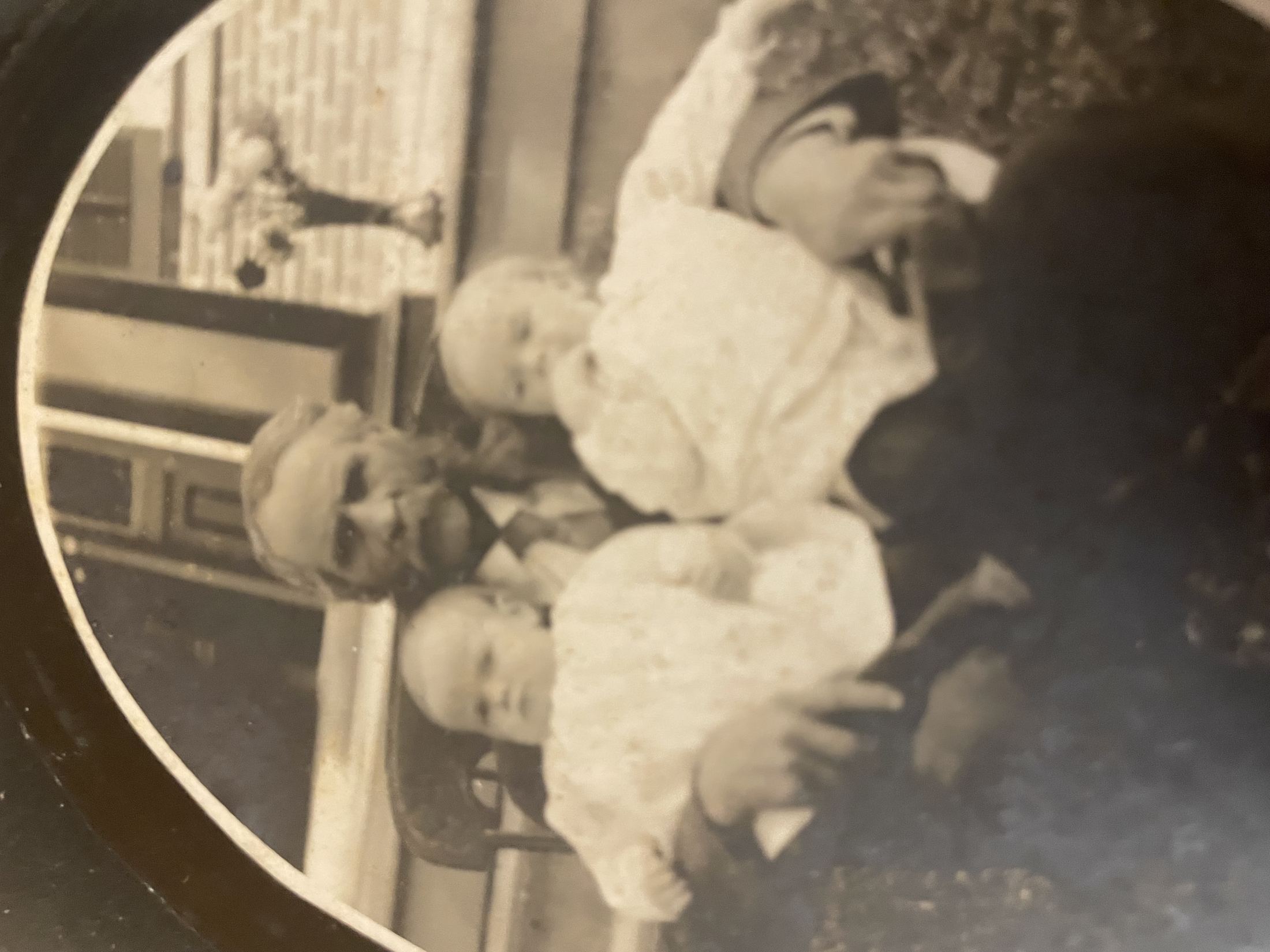 Archival family photograph on the Kingston Place homestead porch